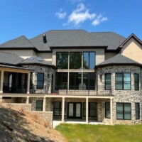 Backview of residential home with tinted windows