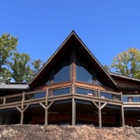 Residential cliffside home with tinted windows